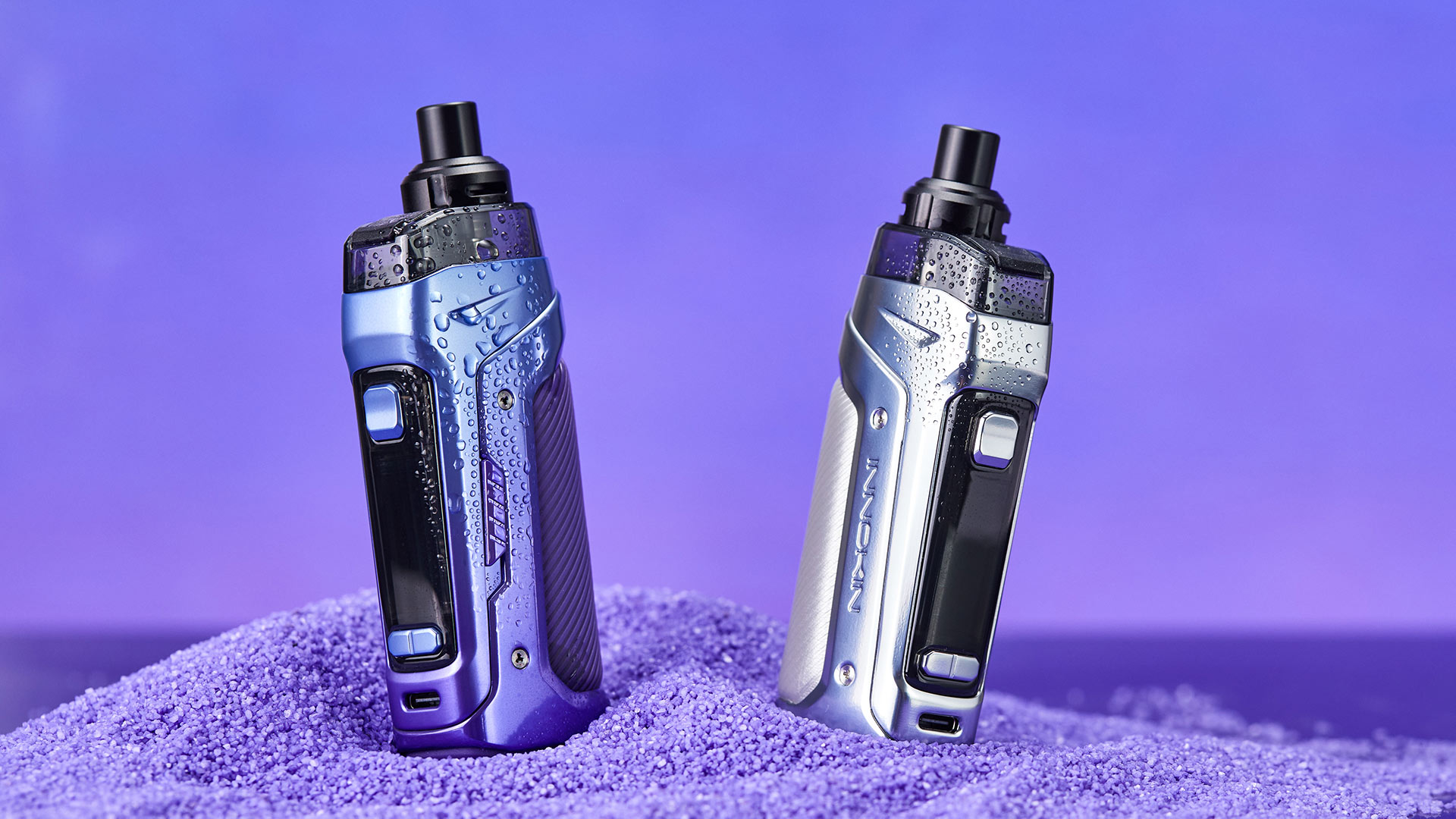 Due cialde Innokin Coolfire PZPulse sigaretta elettronica su una superficie viola